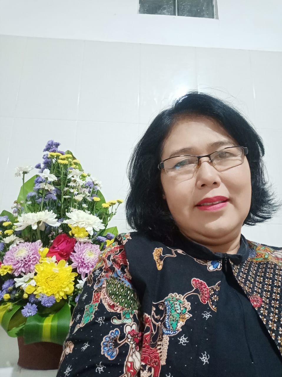 Dr.  Dra. Ni Ketut Ratna Erawati, M. Hum.